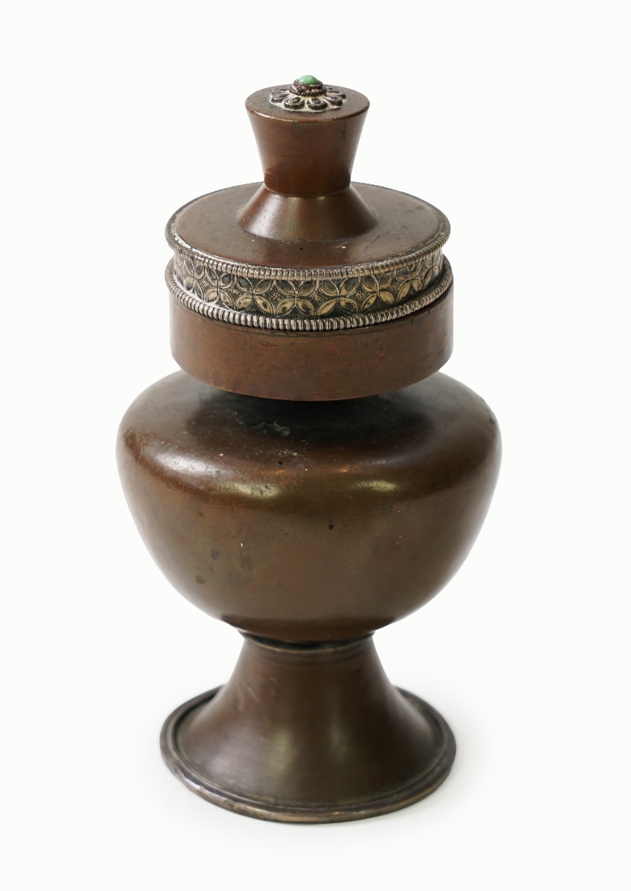 A Tibetan copper and silver mounted ink-stand, 19th century